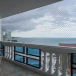 Image of balcony with chairs and table in Coronado Country Club