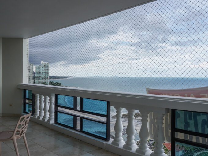 Image of balcony with chairs and table in Coronado Country Club