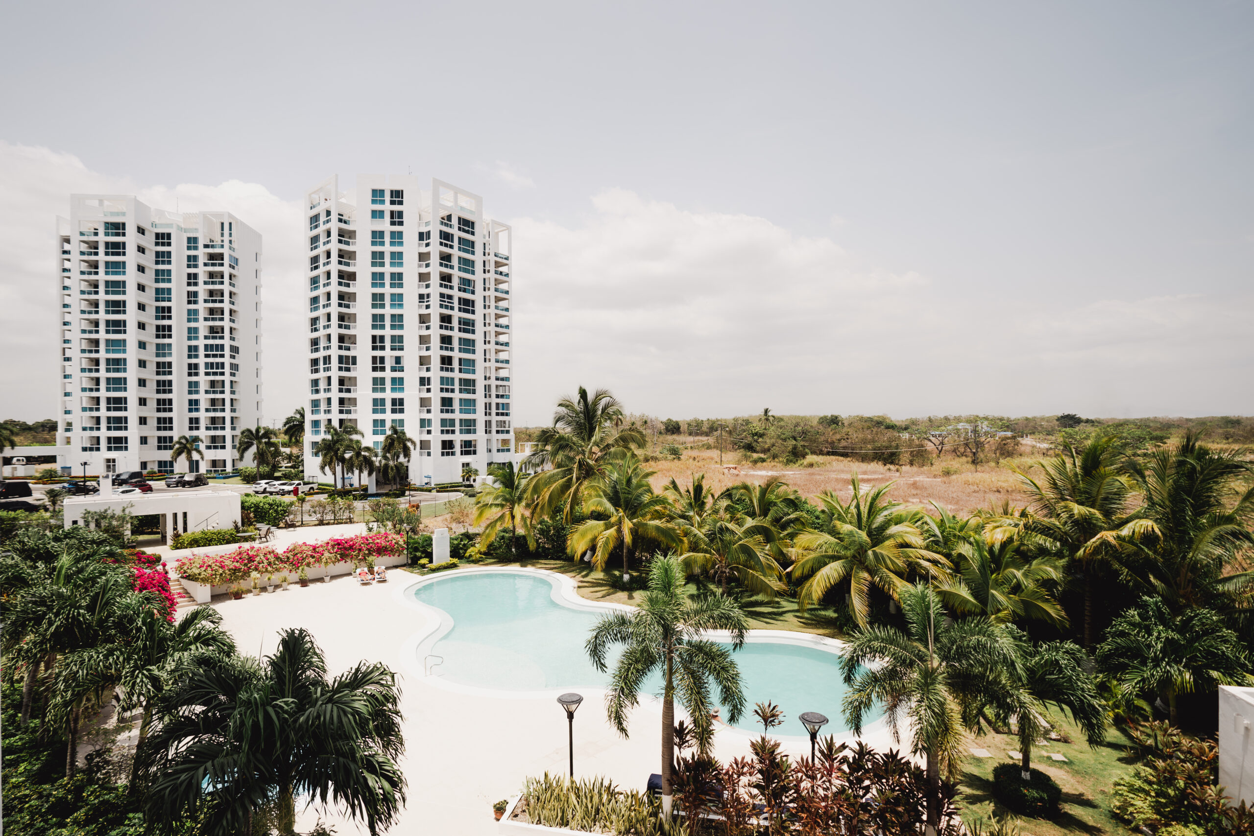 Image of the swimming pool and outside of Founders building at Playa Blanca