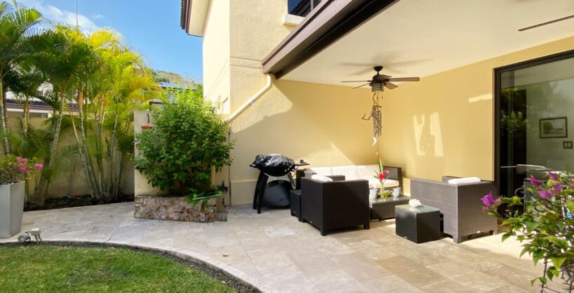 Image of the garden and part of the terrace at this River Valley home