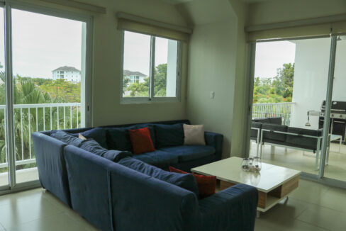 Image of living area with a couch and table at Cocoli