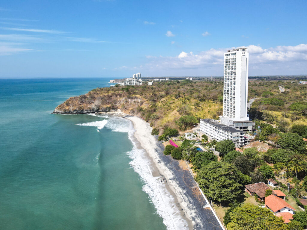 Image of the outside of the building and ocean at the Palms