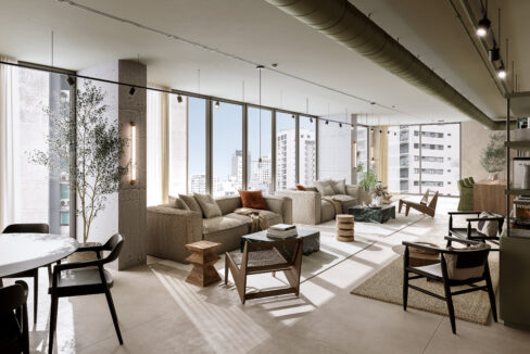 Image of the social area with a couch and table at Amara