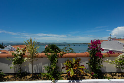 Image of terrace with ocean view in this condo for sale in Cuatro Casas