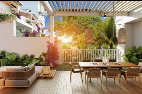 Image of the terrace with table and chairs in this condo in Marina Gardens in Buenaventura