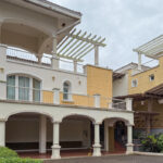 Image of the outside of the Tucan Country Club Building