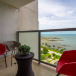 Image of Terrace with chairs, table and ocean views in Yoo Avenida Balboa