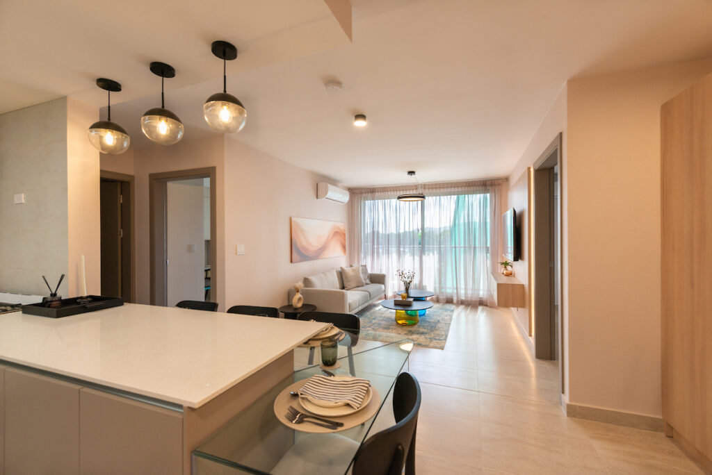 Image of the floor plan with couch, table and kitchen area in this condo in Paterre in Panama Pacifico