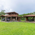 Image of the outside of this El Valle home with garden and terrace