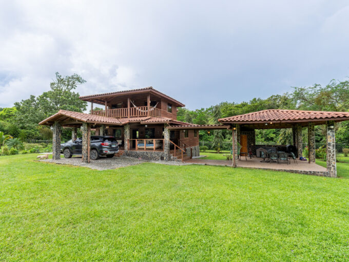Image of the outside of this El Valle home with garden and terrace