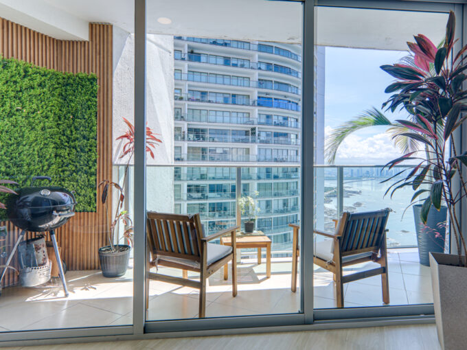 Image of balcony with two chairs in this condo in Oasis on the Bay