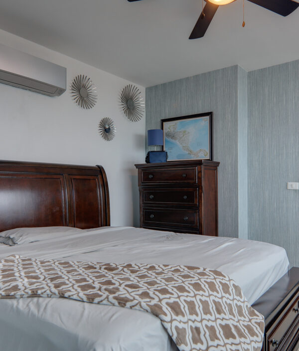 Image of bedroom with closet and bed in this Remodeled Condo for Sale