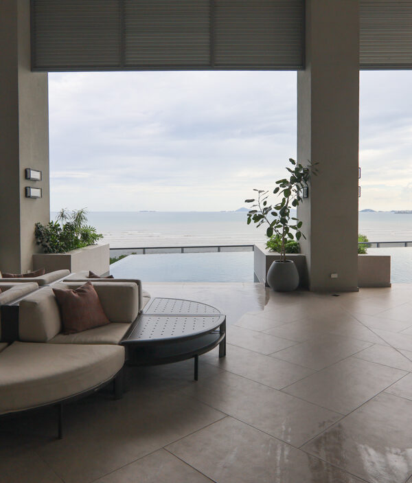 Swimming pool with view of water and city