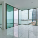 Image of the living room with ocean views in this condo for sale in Pacific Point