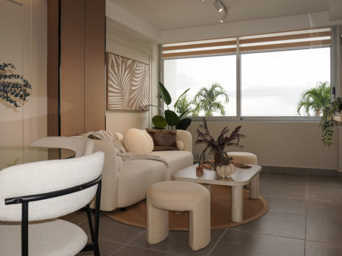 Image of living dining area with table and chairs in this condo for sale in The Palms
