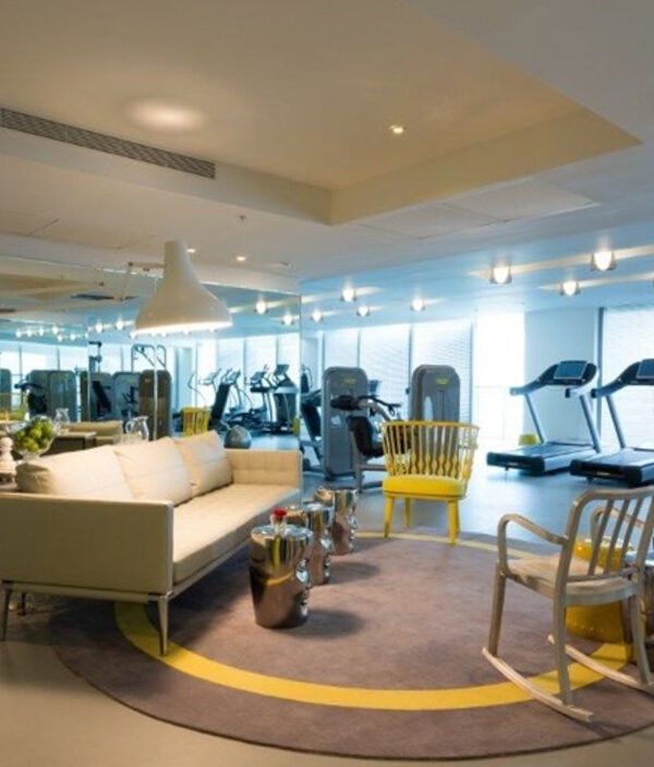 Image of couches and gym in Yoo Tower
