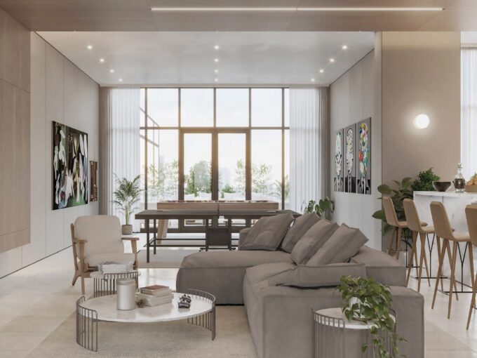 Image of living area with couch and kitchen in this Model C Condo for Sale at Aquapoint, Punta Paitilla