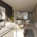 Living room with couch and table in this condo for sale in Panorama