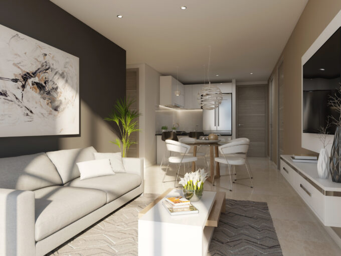 Living room with couch and table in this condo for sale in Panorama