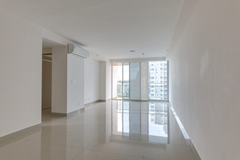 Image of living area with view of balcony in this condo for rent in Zaphiro