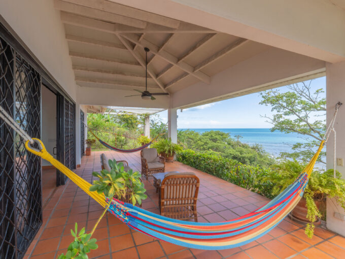 Image of terrace with hammock in this Oceanfront Home for Sale in Playa Corona