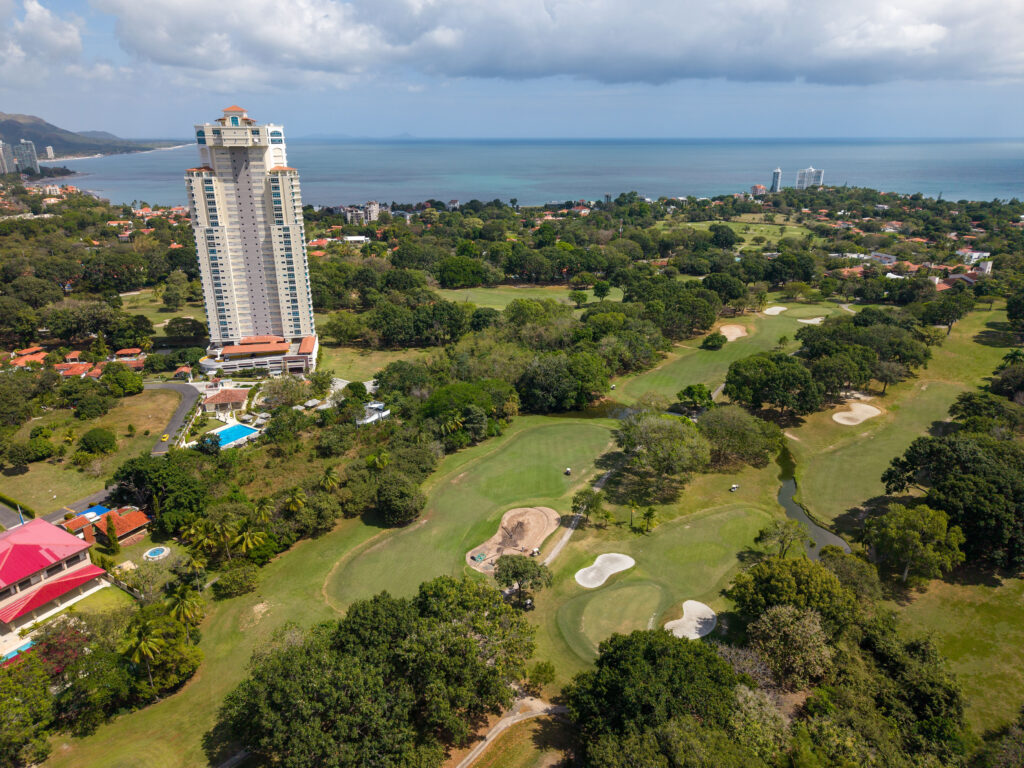 Image of the green views and surrounding buildings from Coronado Golf