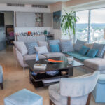 Image of living area with table and chairs in this condo for sale in Destiny