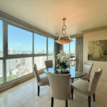 Image of dining room with table and chairs in this condo for sale in Arboleda