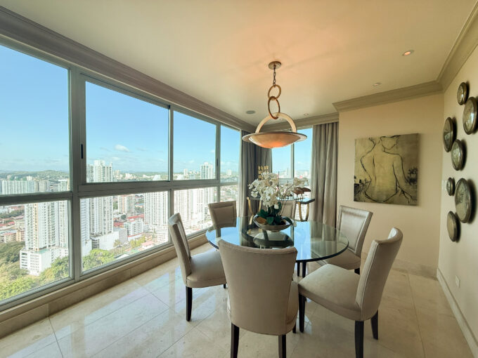 Image of dining room with table and chairs in this condo for sale in Arboleda