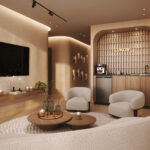 Image of living area with television and two chairs in this Model C condo for sale in Luxor 500