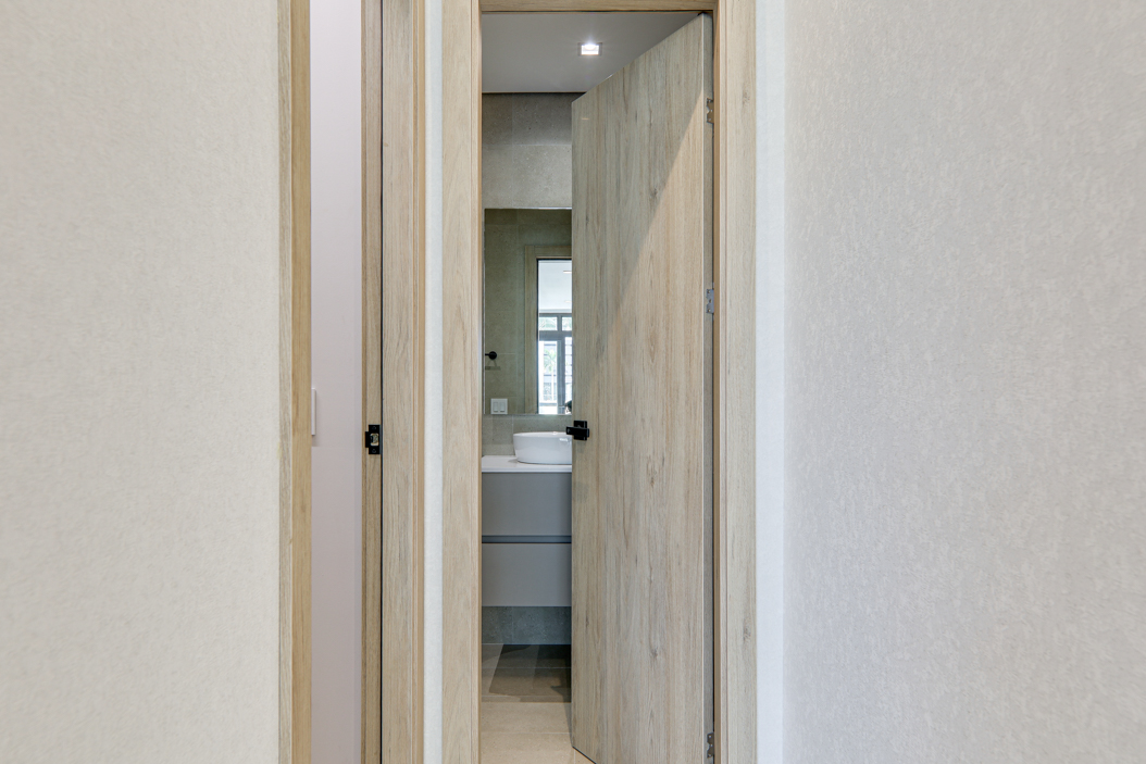 Bathroom door in this Nogal Condo for sale