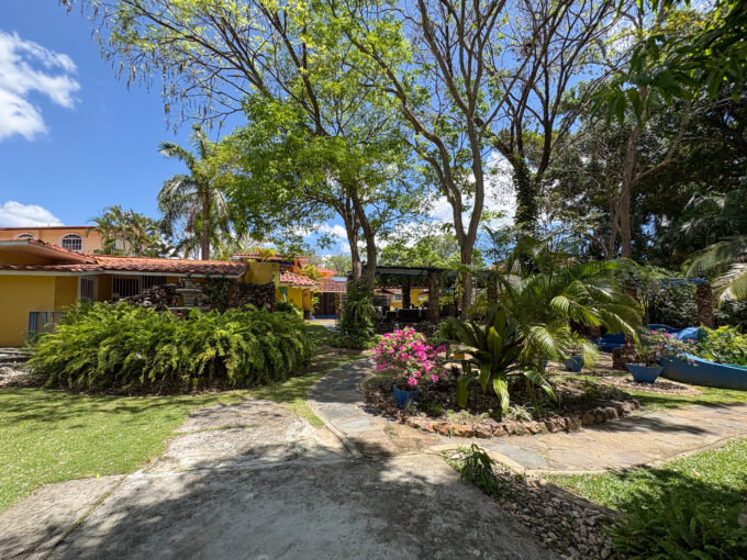 Image of the outside of this large family home for sale in Coronado Golf