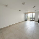 Image of large room with balcony in this condo for sale in Luxor 300