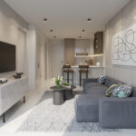 Image of the living room with television and couch in this condo for sale in Alive Art District