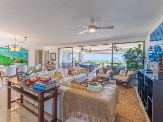 Image of living room with couch in this 3-bedroom condo for sale in Punta Barco