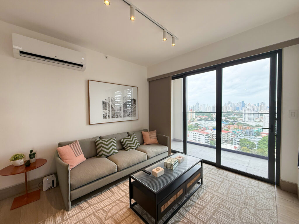 Image of living room with window and couch in Balcony