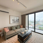 Image of living room with window and couch in this condo for sale in Balcony