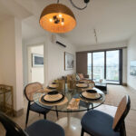 Image of dining space with table and chairs in this condo for sale in Balcony
