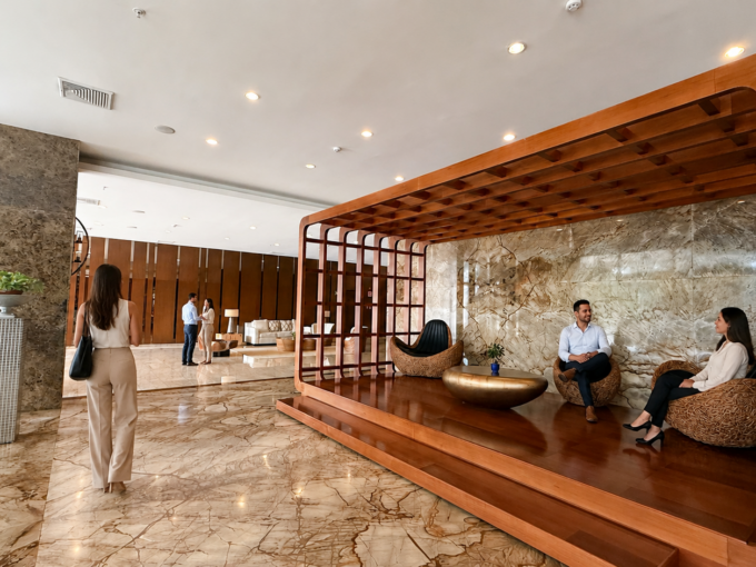 Modern luxury residential building lobby with marble floors and lounge seating for Panama property management for foreign owners in Panamá City by Panama Equity Real Estate