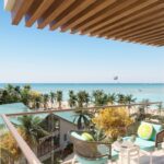 Image of balcony with ocean views in this home for sale in Margaritaville