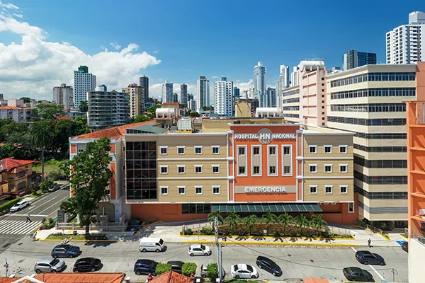 Exterior view of Hospital Nacional building demonstrating modern healthcare access for Panama property management for foreign owners in Panamá City by Panama Equity Real Estate
