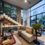 Cozy living room with stairwell and furniture in Dovle Sevla