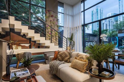 Cozy living room with stairwell and furniture in Dovle Sevla
