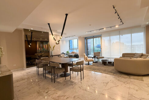 Stunning living room with marble floors and floor to ceiling in Regalia