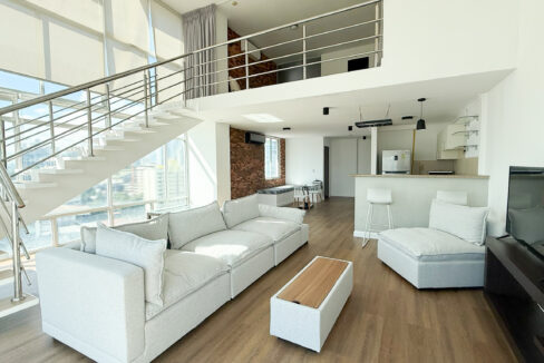 Living room with furniture in Mediterraneo Loft