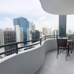 Curved balcony with city views in this condo for sale in Galeria Uno in Obarrio