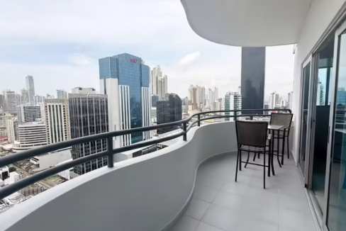 Curved balcony with city views in this condo for sale in Galeria Uno in Obarrio