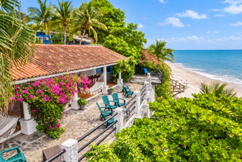 Views of the terrace and ocean from this home for sale in Playa Corona