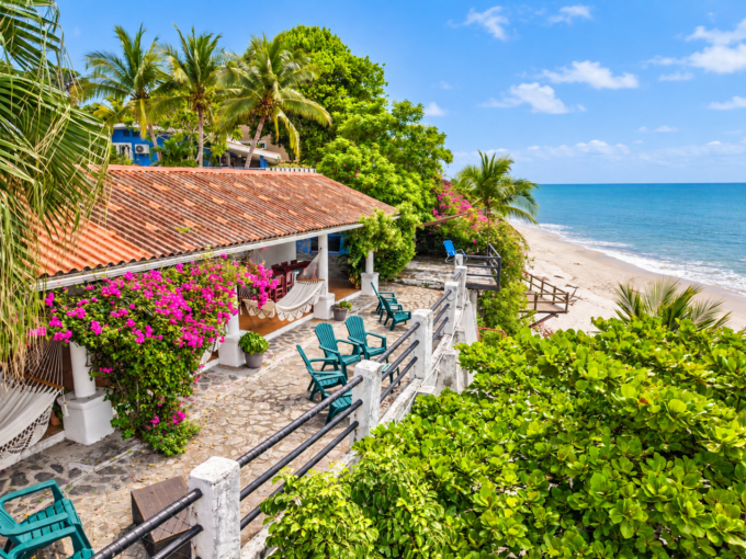 Views of the terrace and ocean from this home for sale in Playa Corona