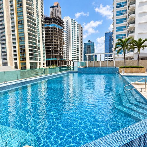 Well-maintained condo pool deck and common area in Panama City